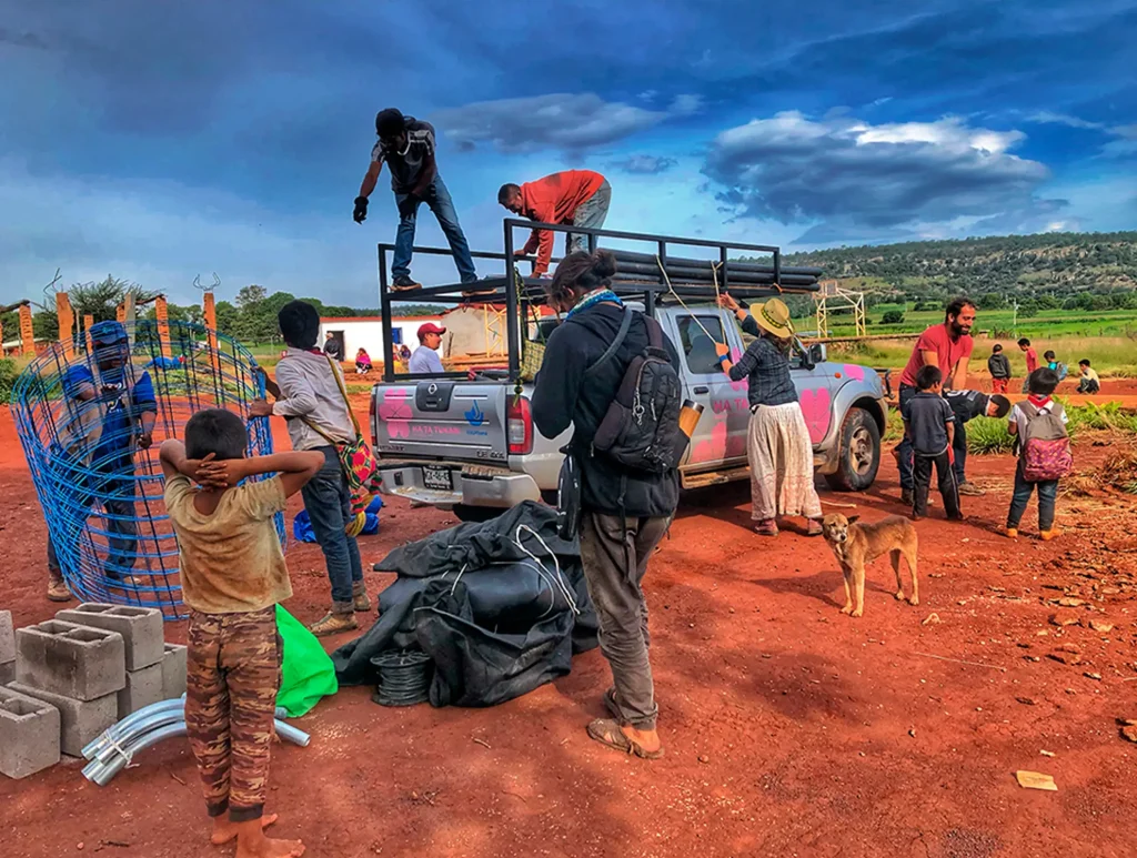 Ha Ta Tukari. Ha Ta Tukari's team taking everything out from the truck getting ready to organize the supplies for the next installations.